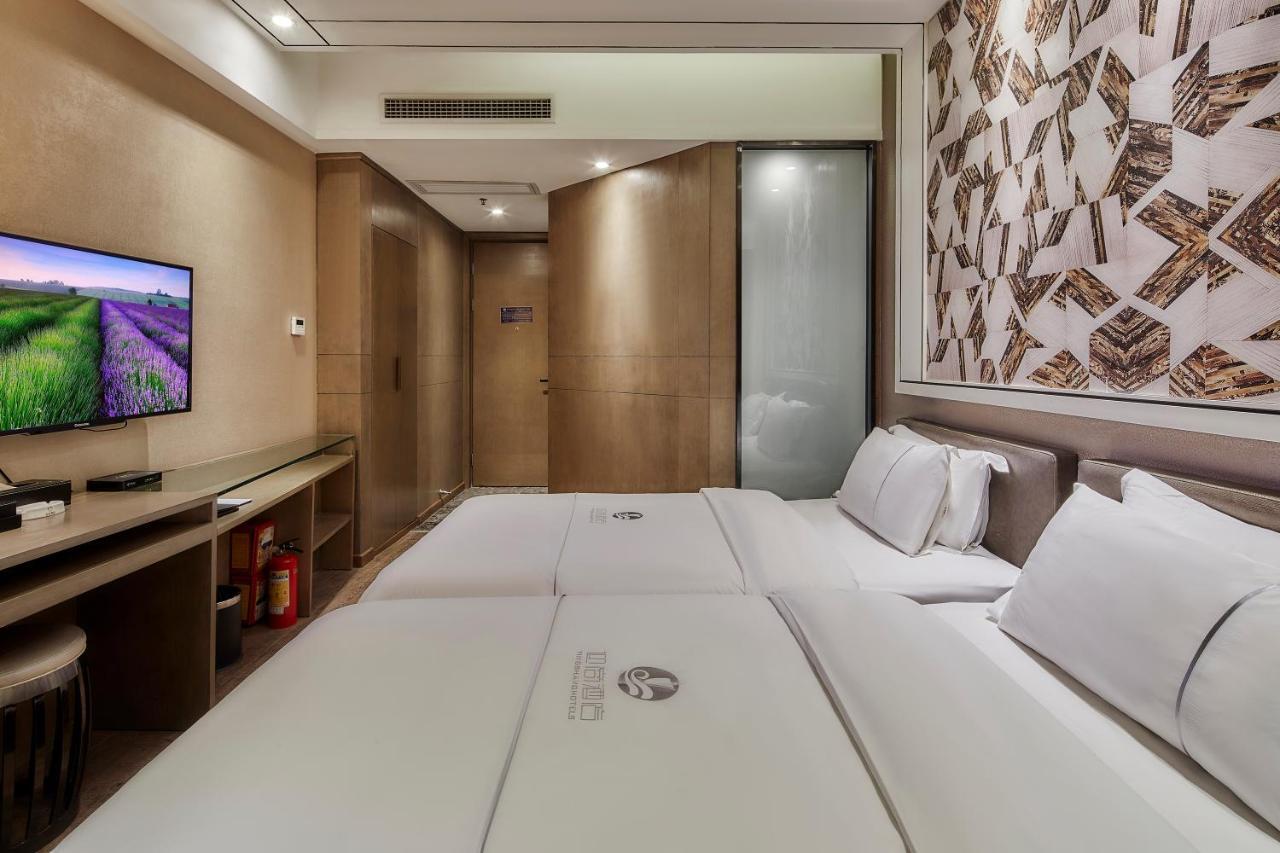 Insail Hotels Canton Extérieur photo